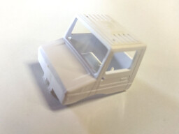 Kabina Mercedes Unimog bílá